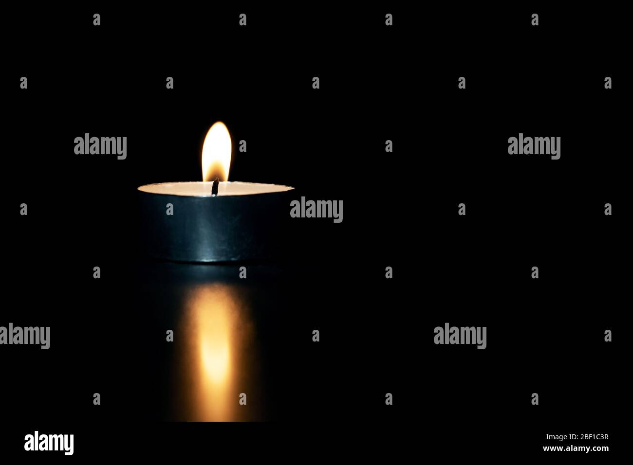 Burning Candle In The Dark With Reflection Stock Photo Alamy