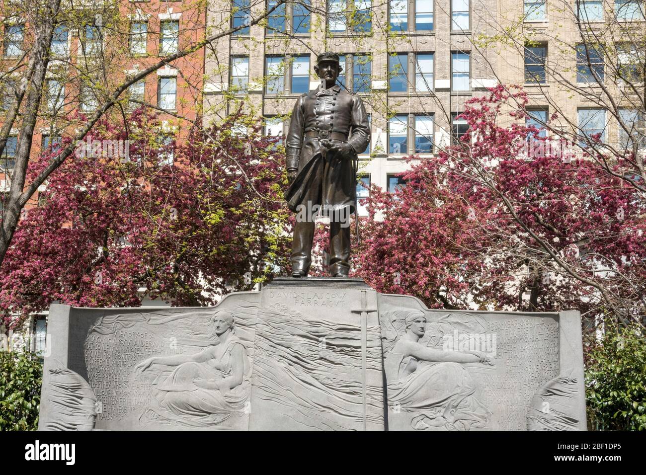 Farragut Monument is surrounded by beautiful spring trees in Madison Square Park, NYC, USA Stock Photo