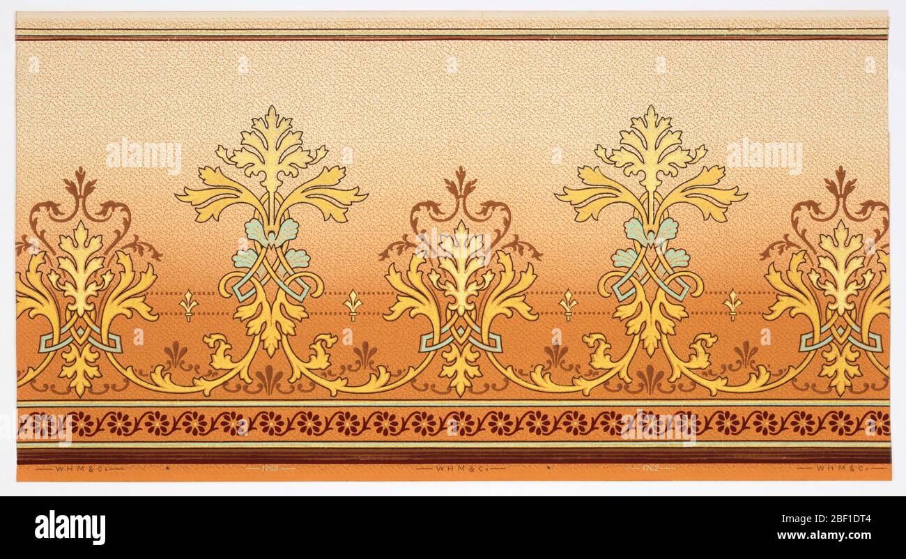 Frieze. Art Nouveau / Mission Style. Alternating large and medium stylized foliate medallions connected by vining scrolls and two lines of square beading with stylized fleur-de-lis. Bottom has striping and floral guilloche. Top has stripes. Stock Photo