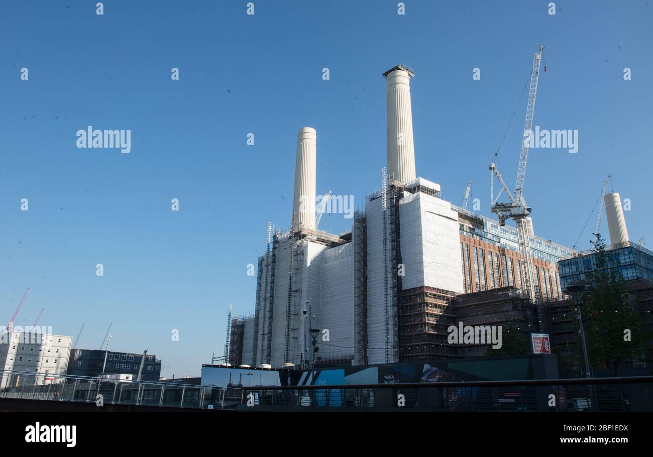 Wednesday April 15th 2020, lockdown from Corona Virus pandemic still in act. Picturing advert warning re Corona Virus restrictions around London . Part of various  location : Vauxhall, Wandsworth,  Battersea, Camden Town. Pictured: Battersea Power station under construction during corona virus outbreak and lock down Stock Photo