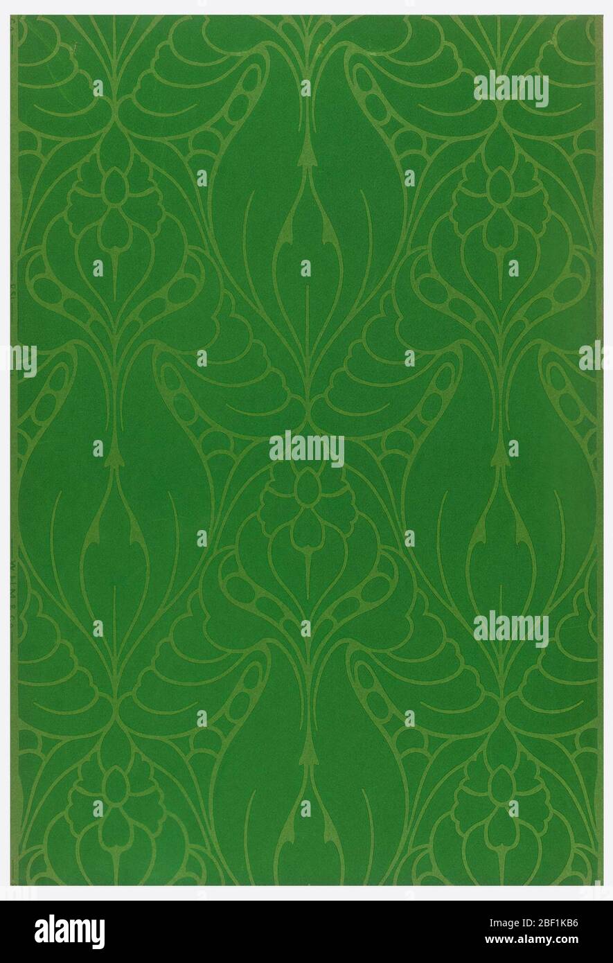 Sidewall sample. Allover large anthemion motifs in light green outline on dark green ground. Stock Photo