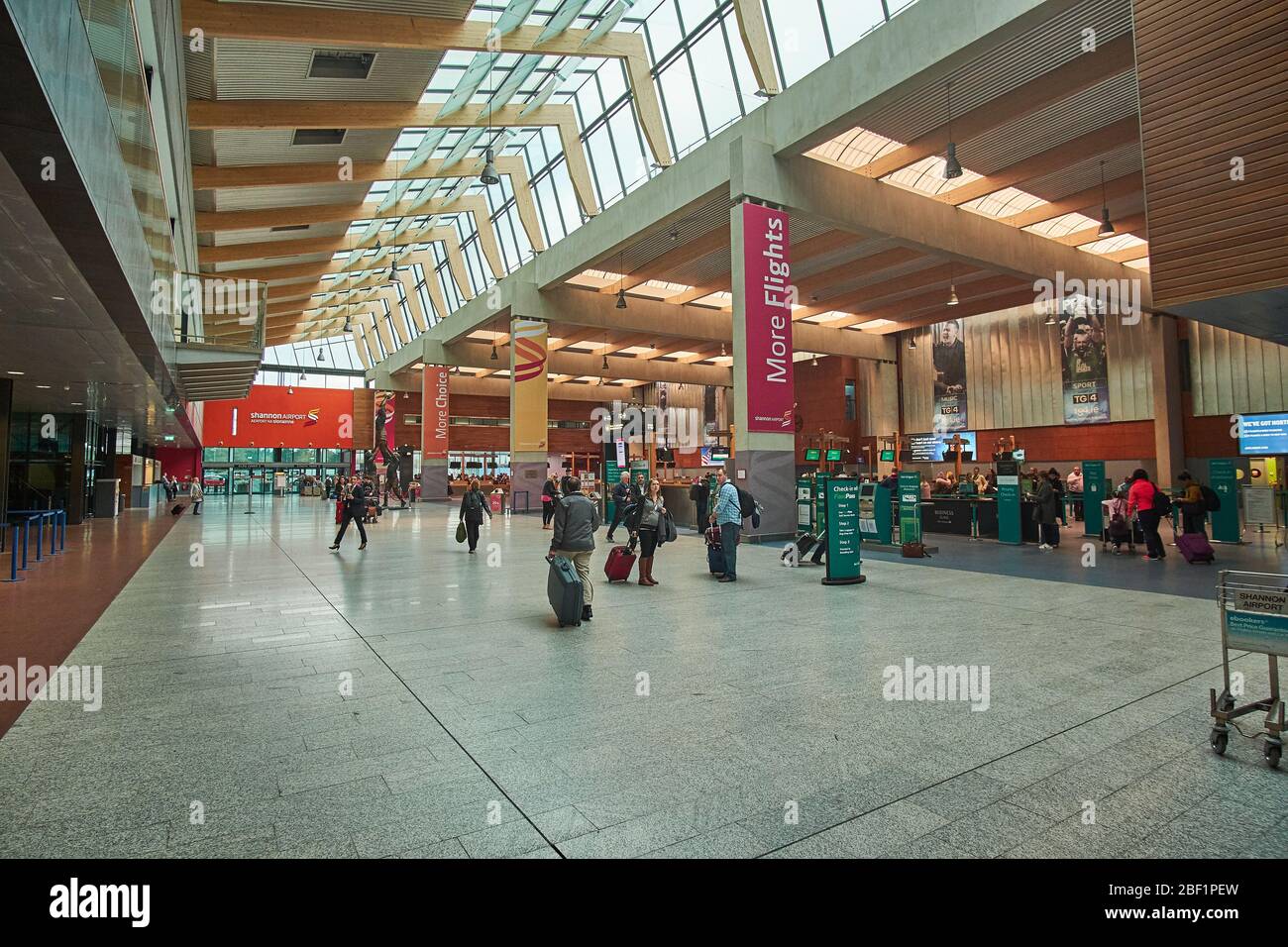 Interior of Shannon SNN Airport in County Clare Ireland with tourists Stock Photo