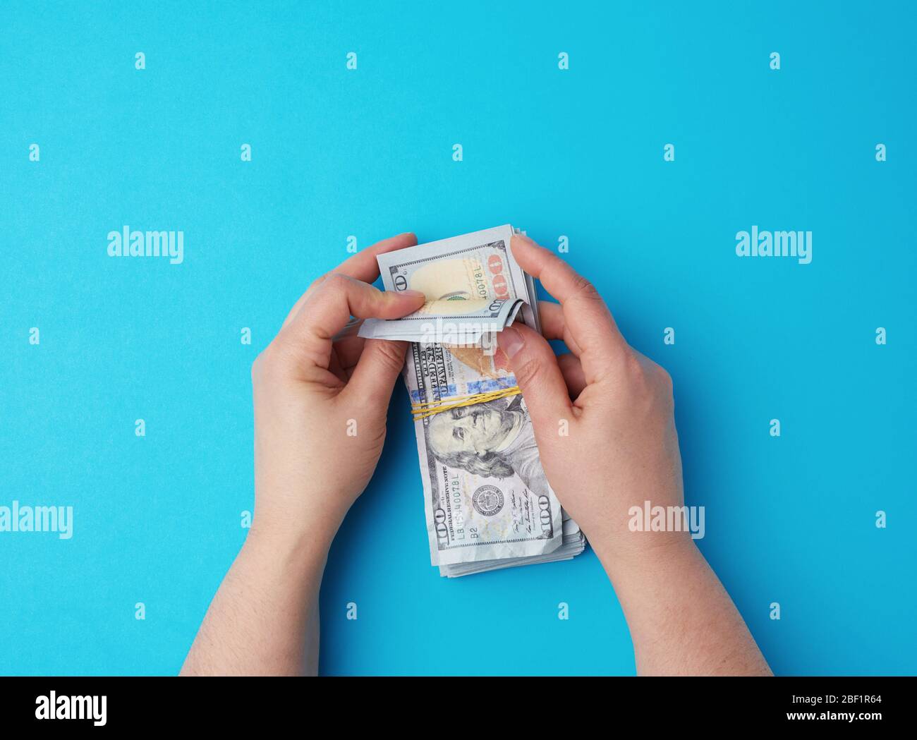 Woman dollar dollars women hand hi-res stock photography and images - Alamy