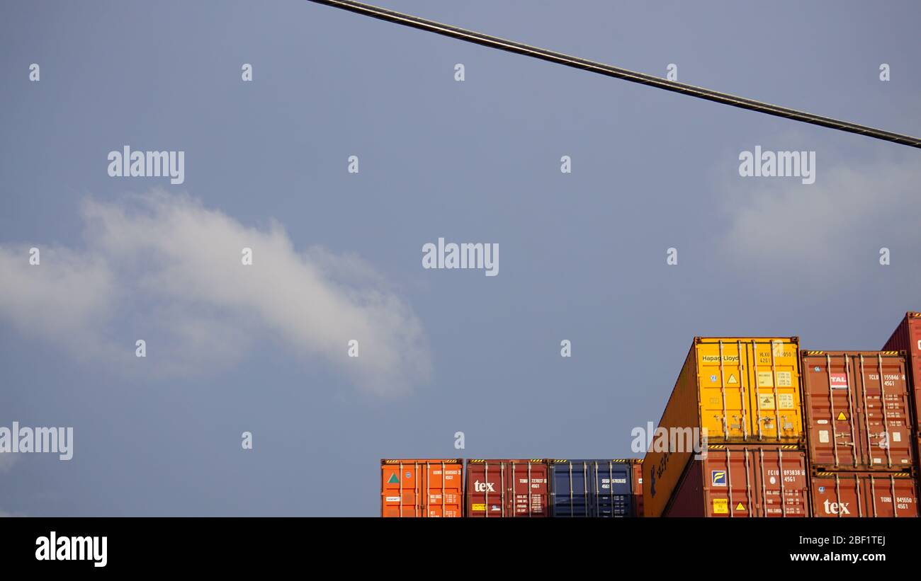International shipping container terminal. Stacks of intermodal containers used for global trade and cargo commerce. Outer Harbor, Port of Oakland. Stock Photo