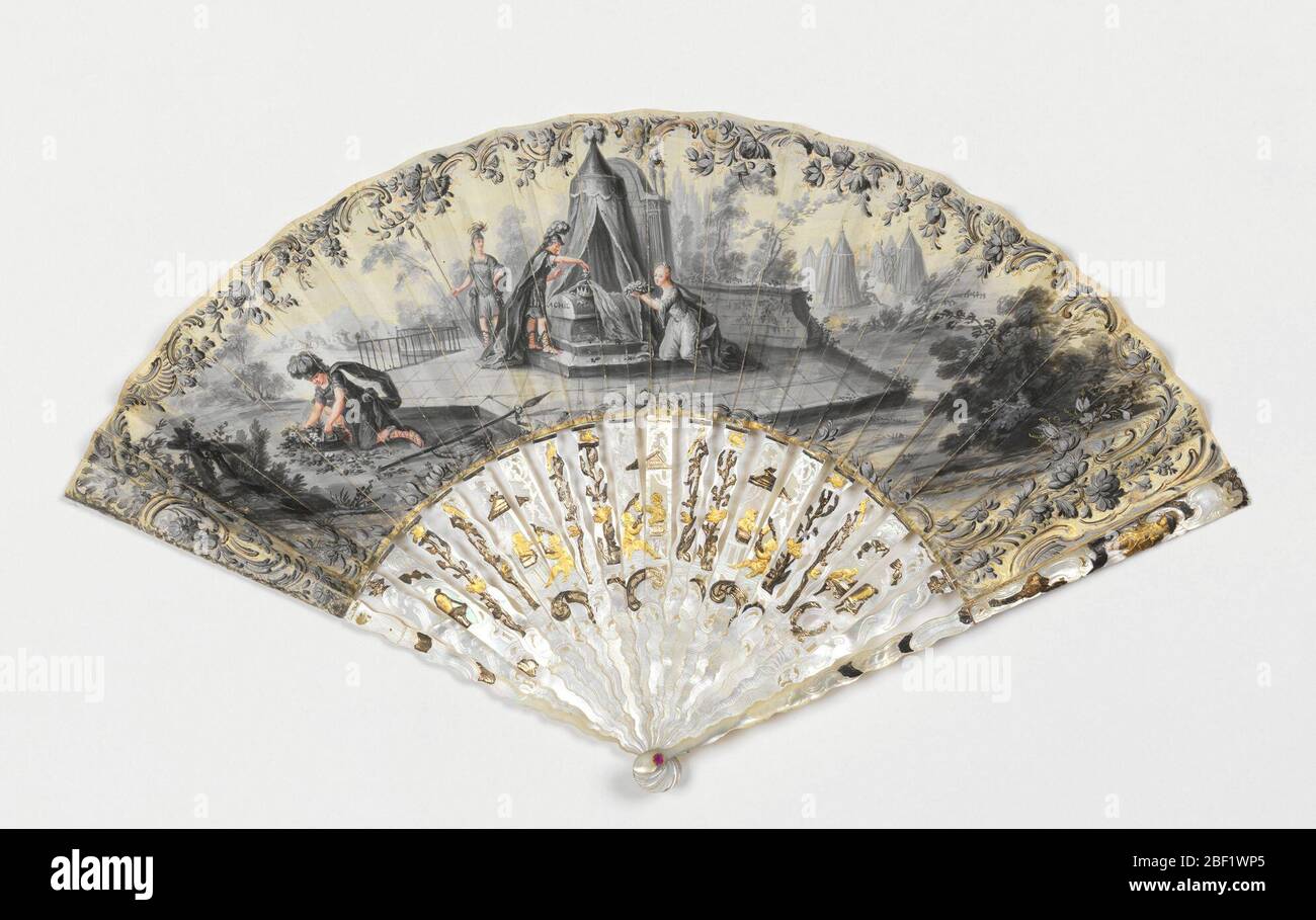 Pleated fan and case. Gilded and gouache-painted skin leaf. Obverse in grisaille: female and warrior figured laying flowers upon a tomb. Reverse in grisaille: Italian landscape. Sticks and guards, pierced mother-of-pearl with metal foil, showing putti with birds. Stock Photo