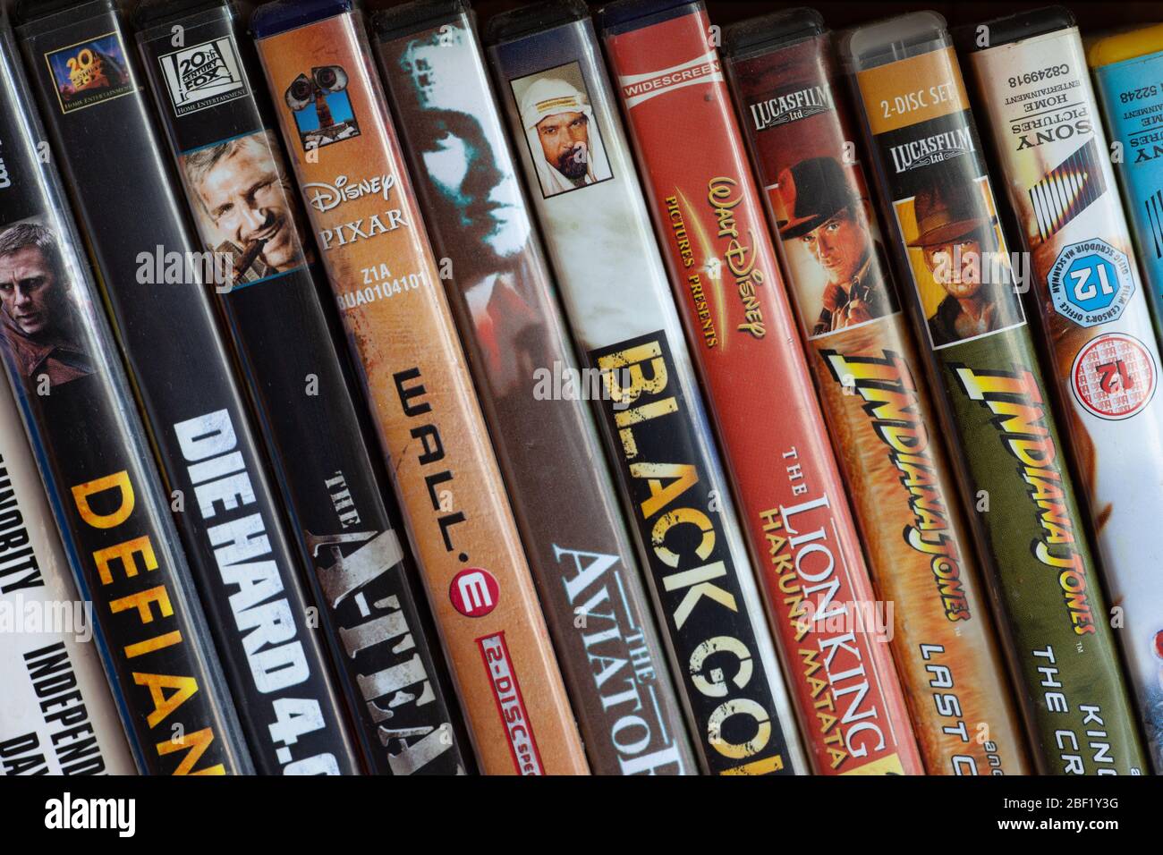 Row of DVD's on shelf. UK Stock Photo