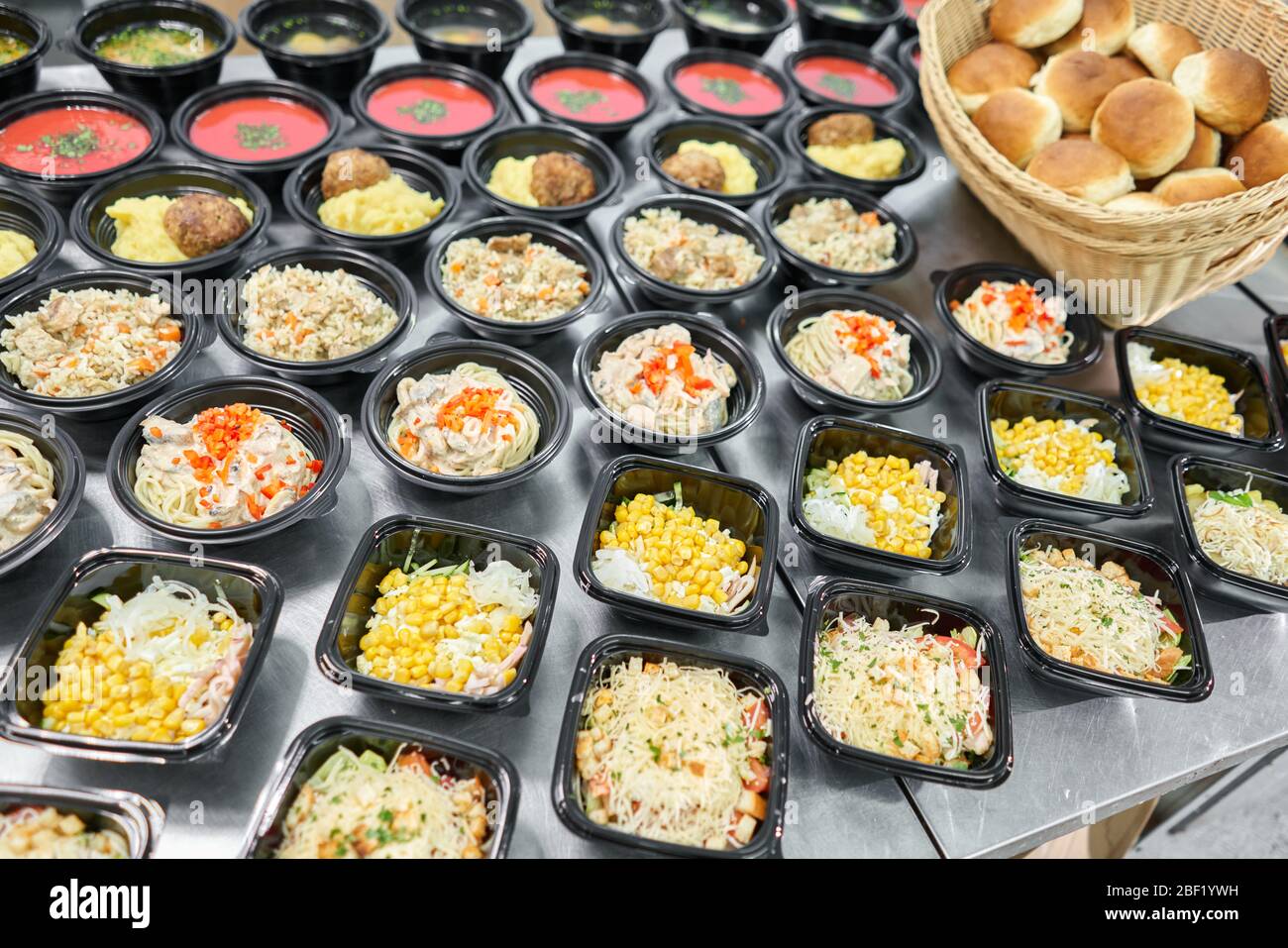 Row of plastic disposable lunch box with healthy natural food. Soups, cream  soup, main course with side dish, salads. Food delivery. Lunch in the Stock  Photo - Alamy