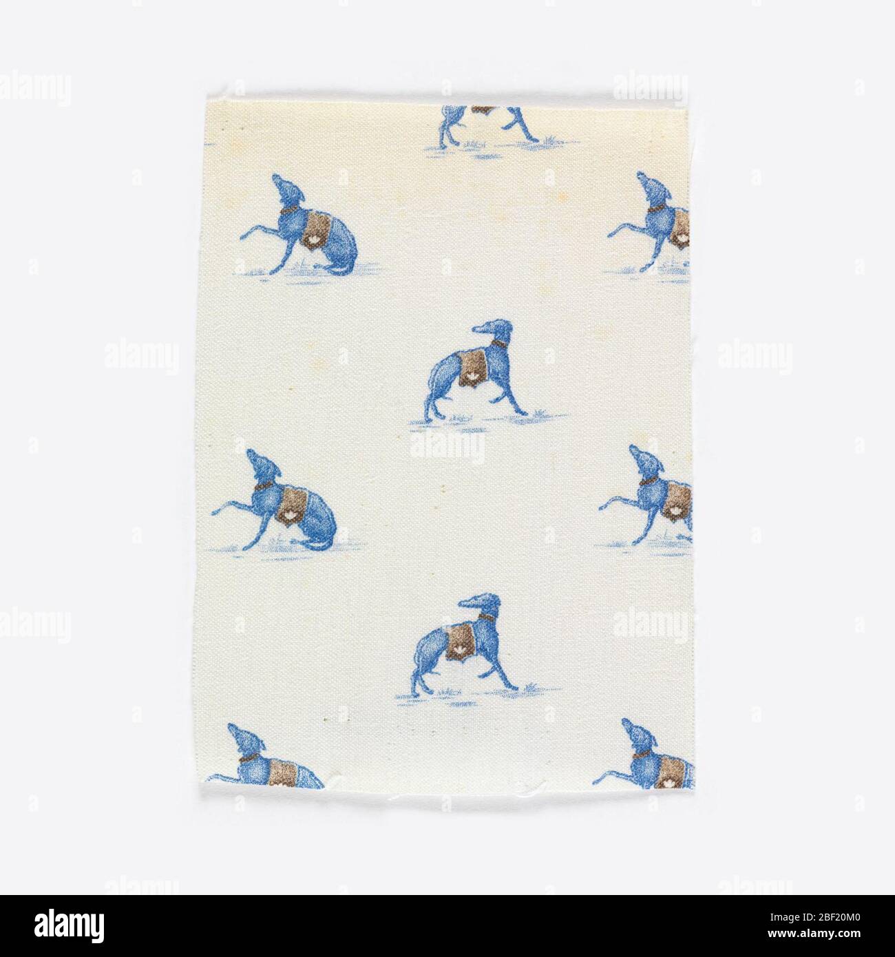 Sample. Woven cotton textile printed in blue and brown on white ground ...