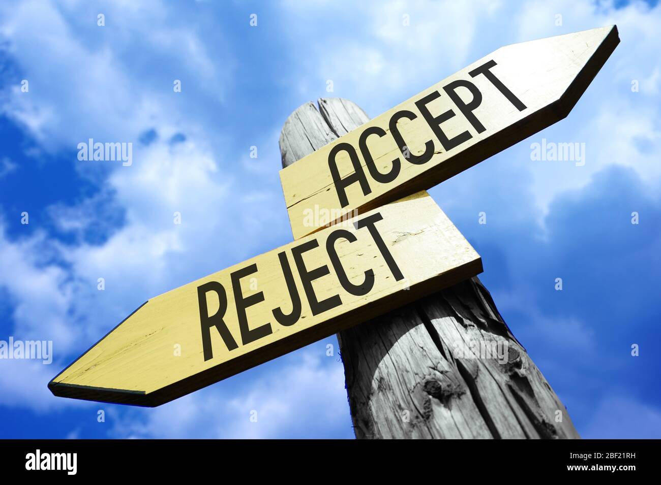Accept, reject - wooden signpost Stock Photo