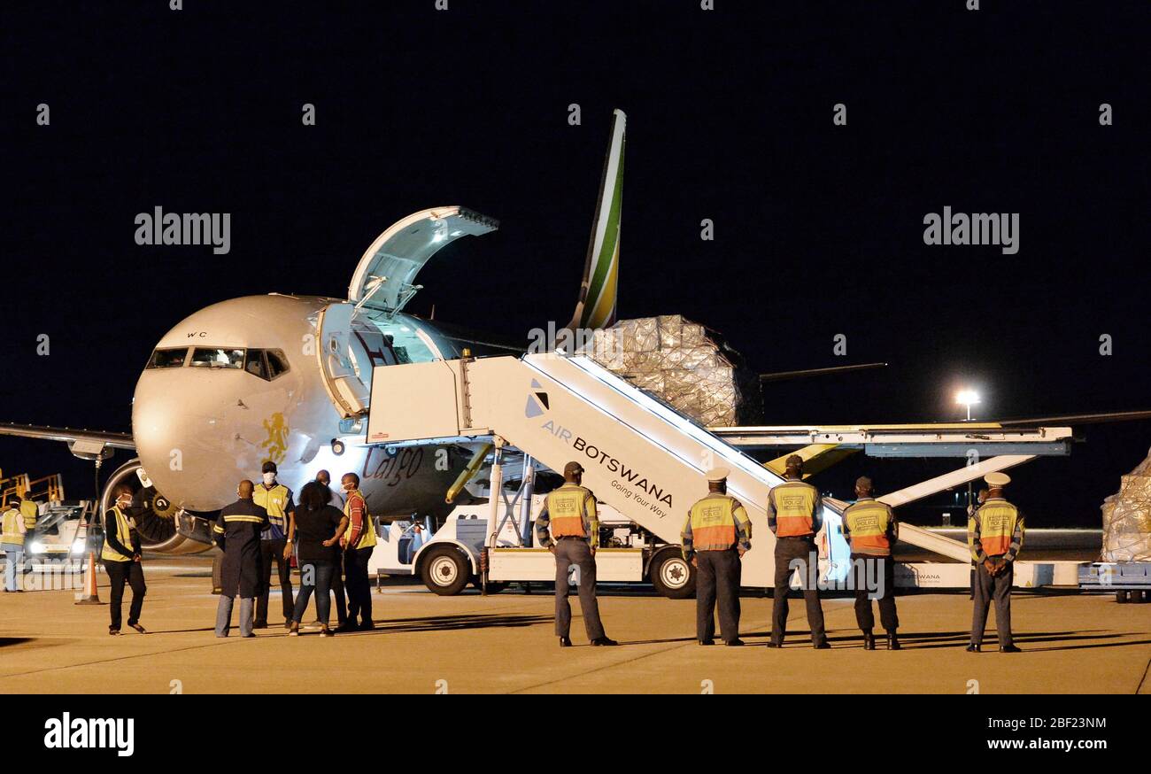Gaborone. 16th Apr, 2020. Workers unload medical supplies from Jack Ma
