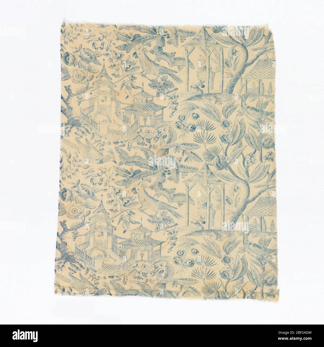 Textile. Pattern of chinoiserie type; with pagodas, male figures, and birds amid foliage. At top piece is gathered into band and fitted with tapes, possibly for a valance. Stock Photo