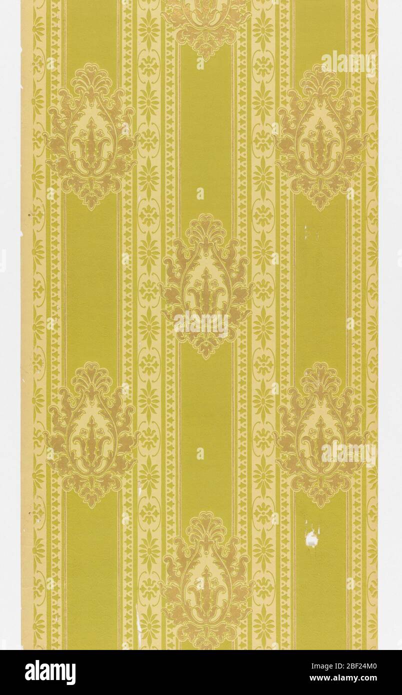 Sidewall. Medallion stripe design; metallic gold foliate medallions on green bands alternate with stylized floral bands. Printed in metallic gold and yellow-green on an embossed mica ground. Stock Photo