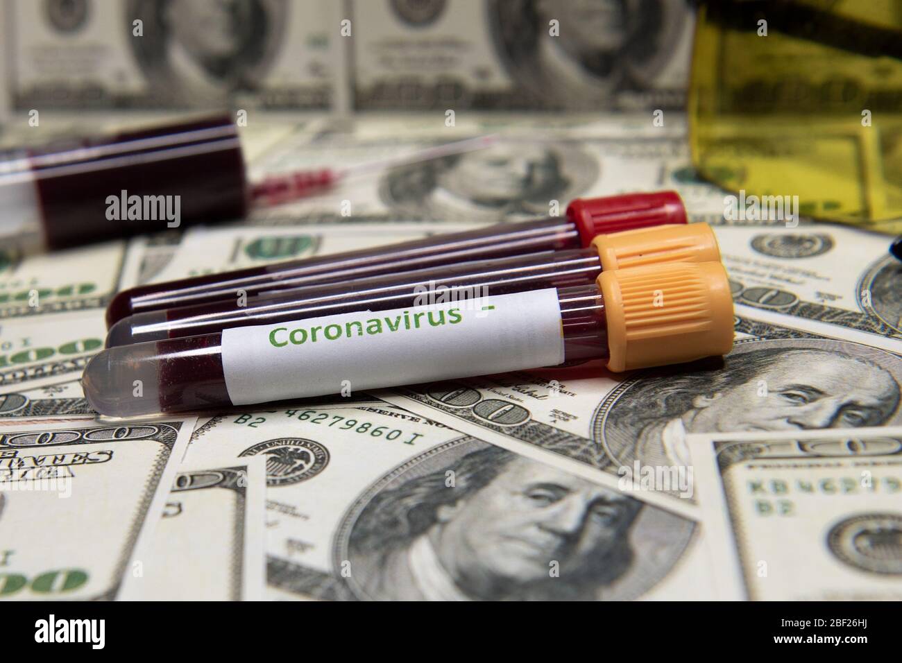 Dollars and negative test at coronavirus. Stock Photo