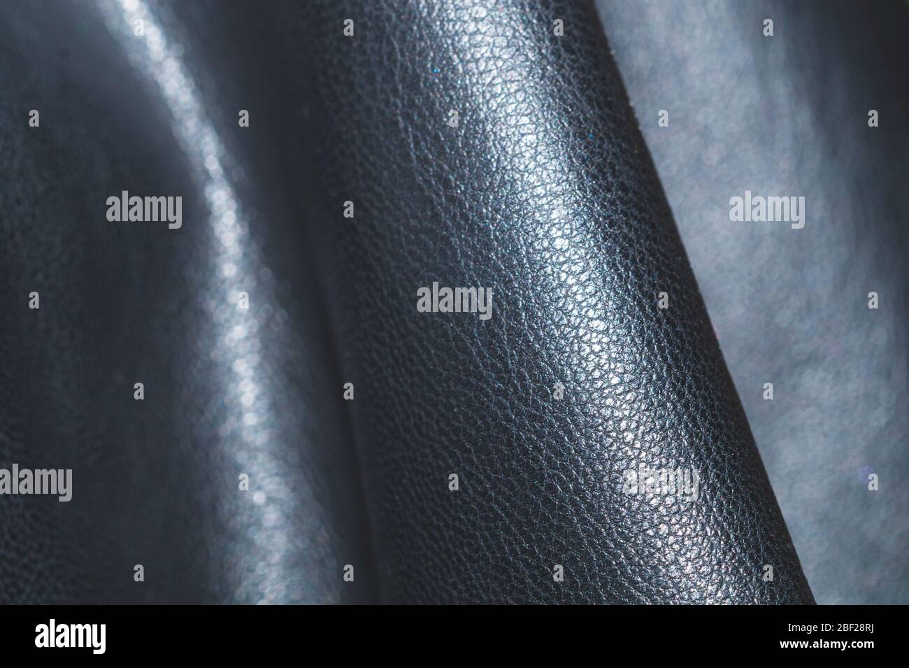 Black leather close up. rough material abstract background Stock Photo
