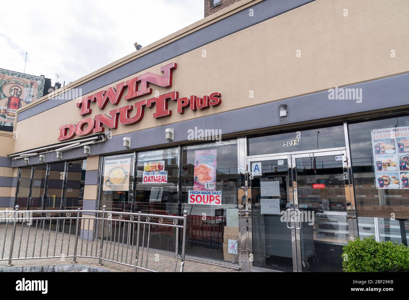 New York, NY - April 16, 2020: Twin Donuts restaurant is closed amid COVID-19 pandemic in Inwood neighborhood of Manhattan Stock Photo