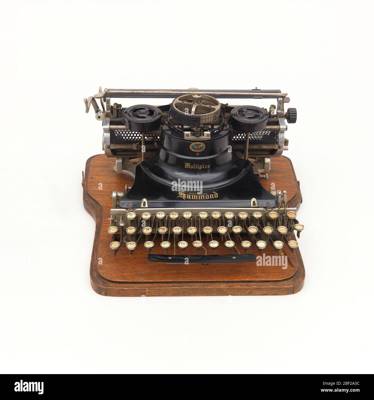 Multiplex. Typewriter composed of a wooden body and metal elements. Inscribed on label, front: 'For All Nations and Tongues.' Stock Photo