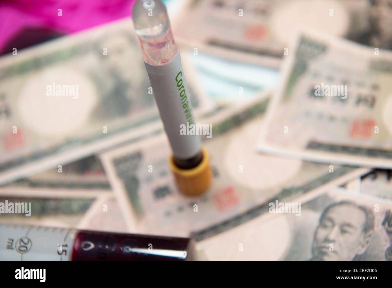 Japanese yen and negative test at coronavirus. Stock Photo