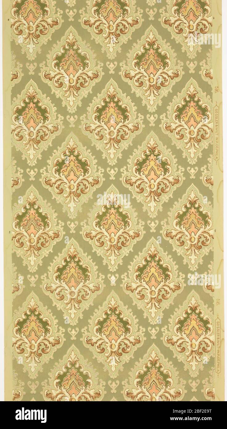 Sidewall. Large individual foliate medallions set close together, with foliate scrolls and horizontal bead and reel motifs. Ground is light green. Printed in greens, browns, gold mica, copper mica, and cream. Stock Photo