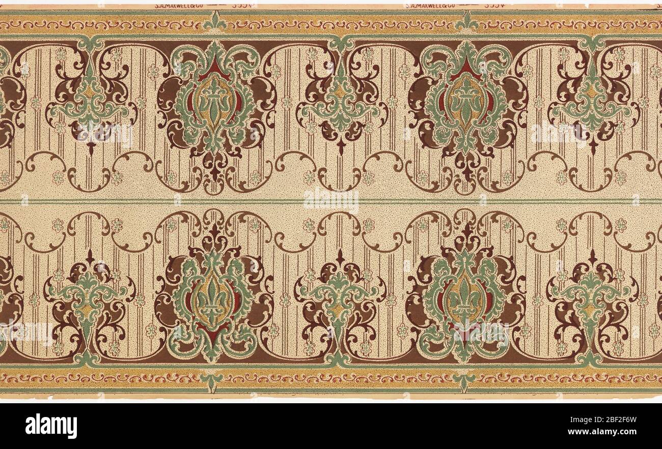 Frieze. Printed two across. Foliate medallions, large containing fleur di lys alternating with smaller, against striped background with scalloped top edge. Printed in deep red, green and tan on off-white spotted ground. Stock Photo