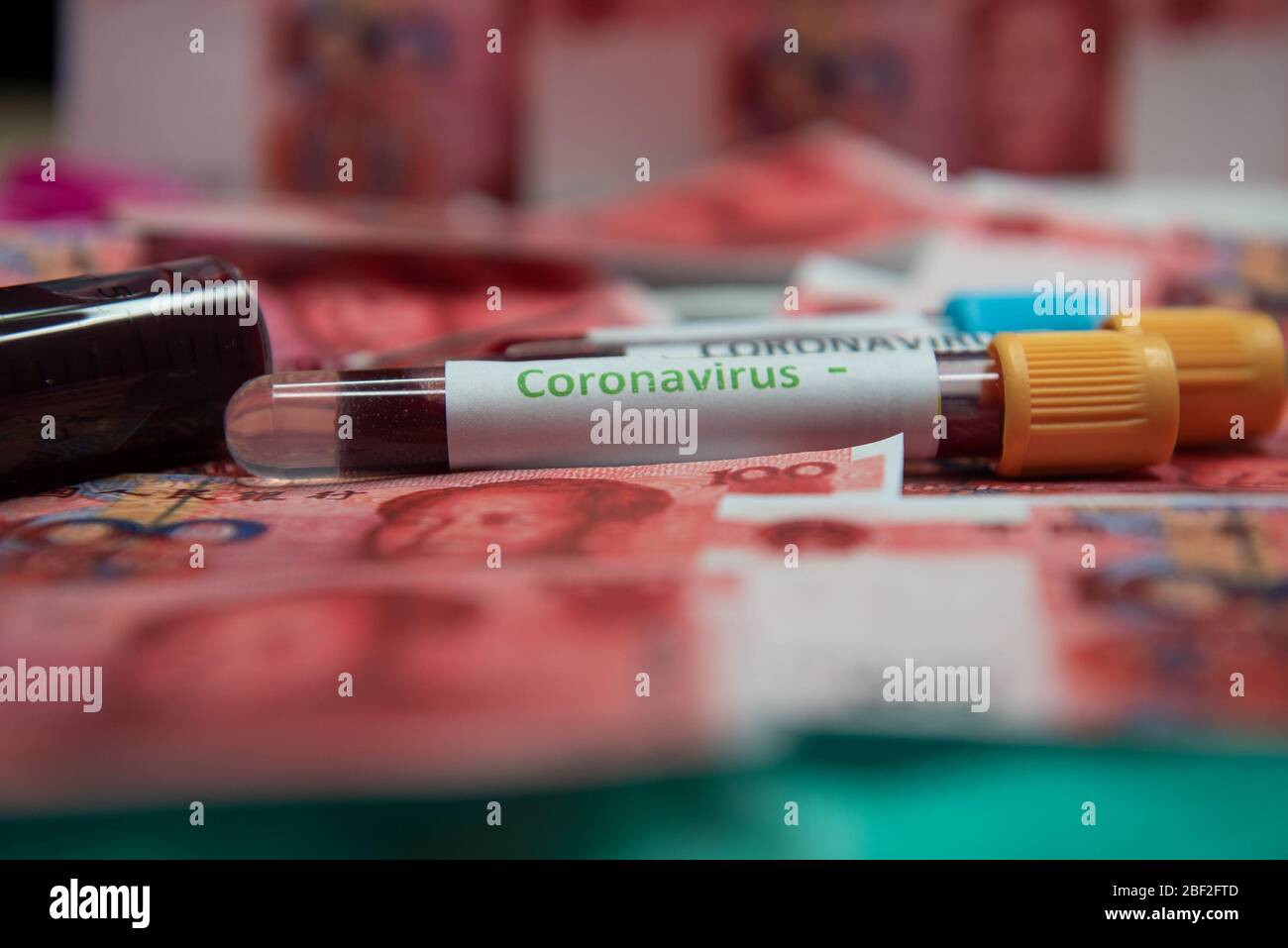 Chinese yuan and negative test at coronavirus. Stock Photo