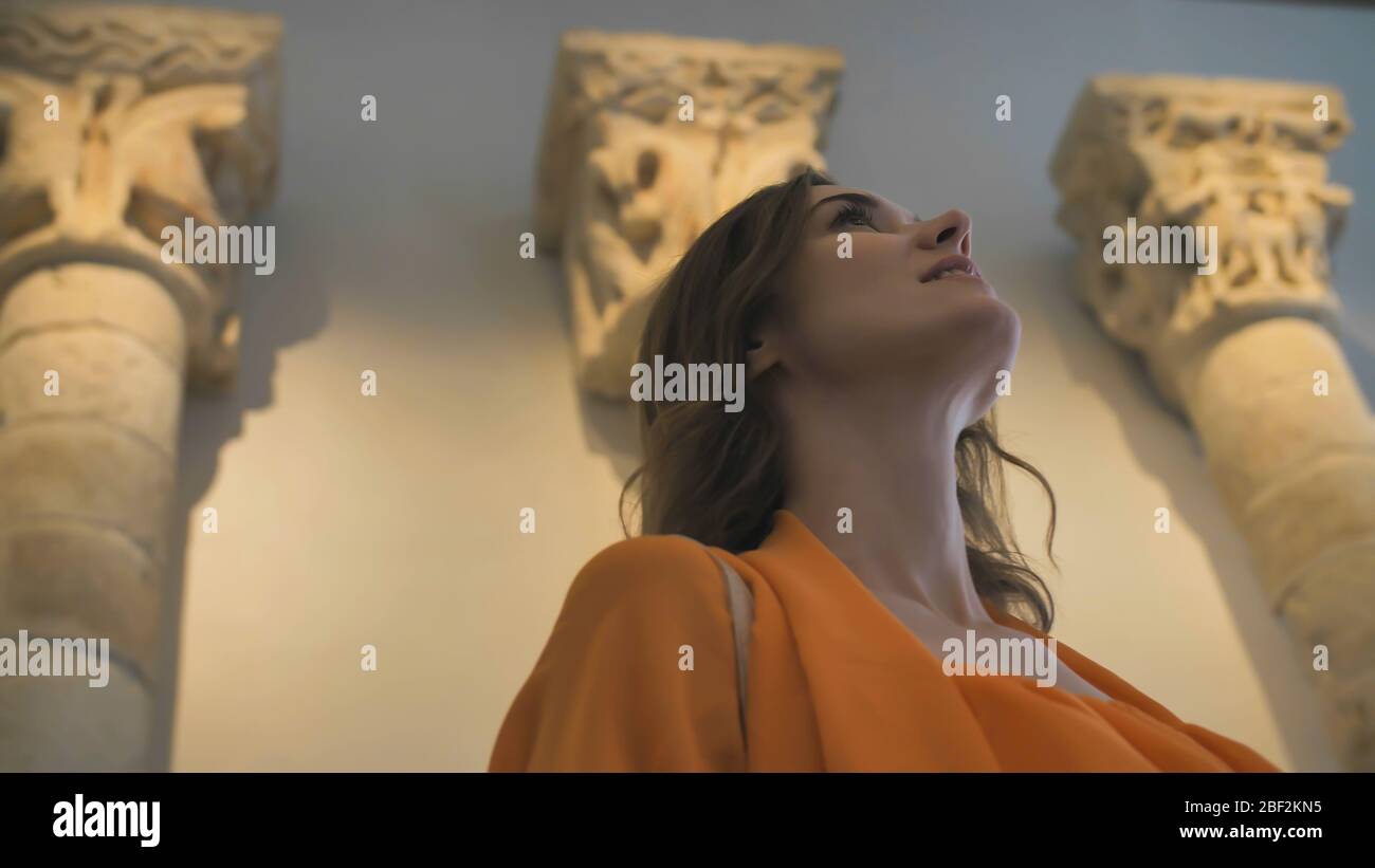 A young girl looks at exhibits in a museum Stock Photo - Alamy