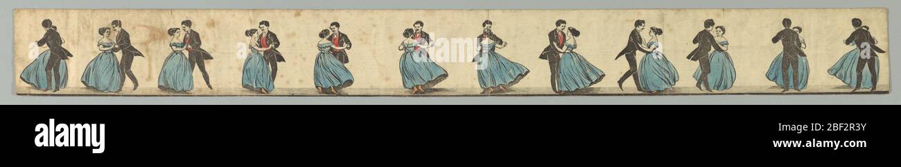 Zoetrope Strip Dancers. Strip with printed cartoon featuring a man and woman dancing in elegant costume. When viewed in a circular, perforated tin zoetrope, illusion of animation creates a moving picture of twirling dancers. Stock Photo
