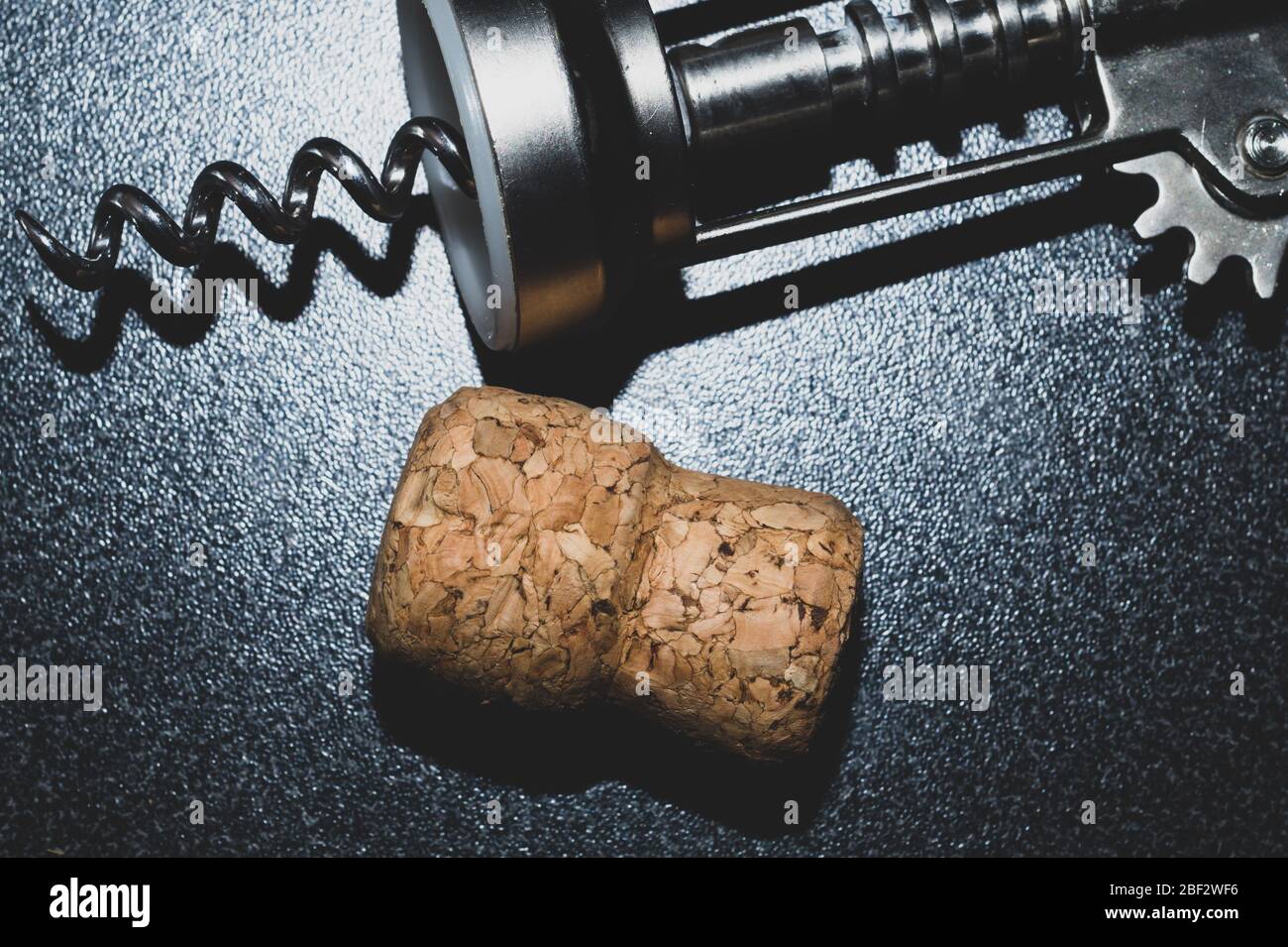 Wine cork and corkscrew on the table close up Stock Photo