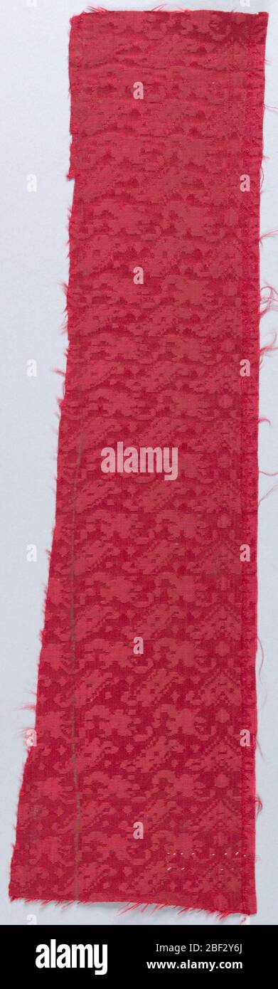 Fragment. Dark crimson damask with small close-set allover design of bars and springs. Stock Photo