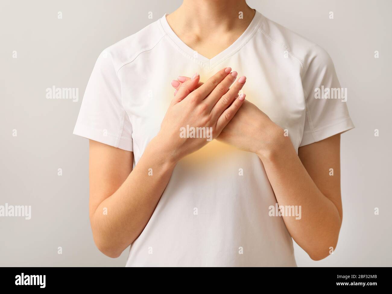 meditating-woman-hands-on-chest-hi-res-stock-photography-and-images-alamy