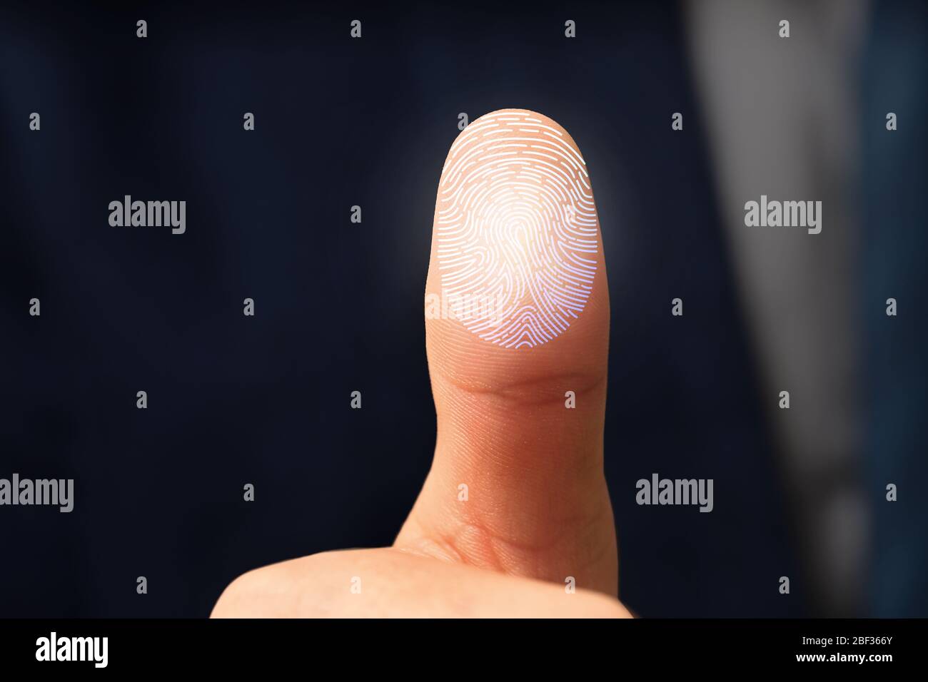 Businessman using fingerprint protection for data access, closeup Stock Photo