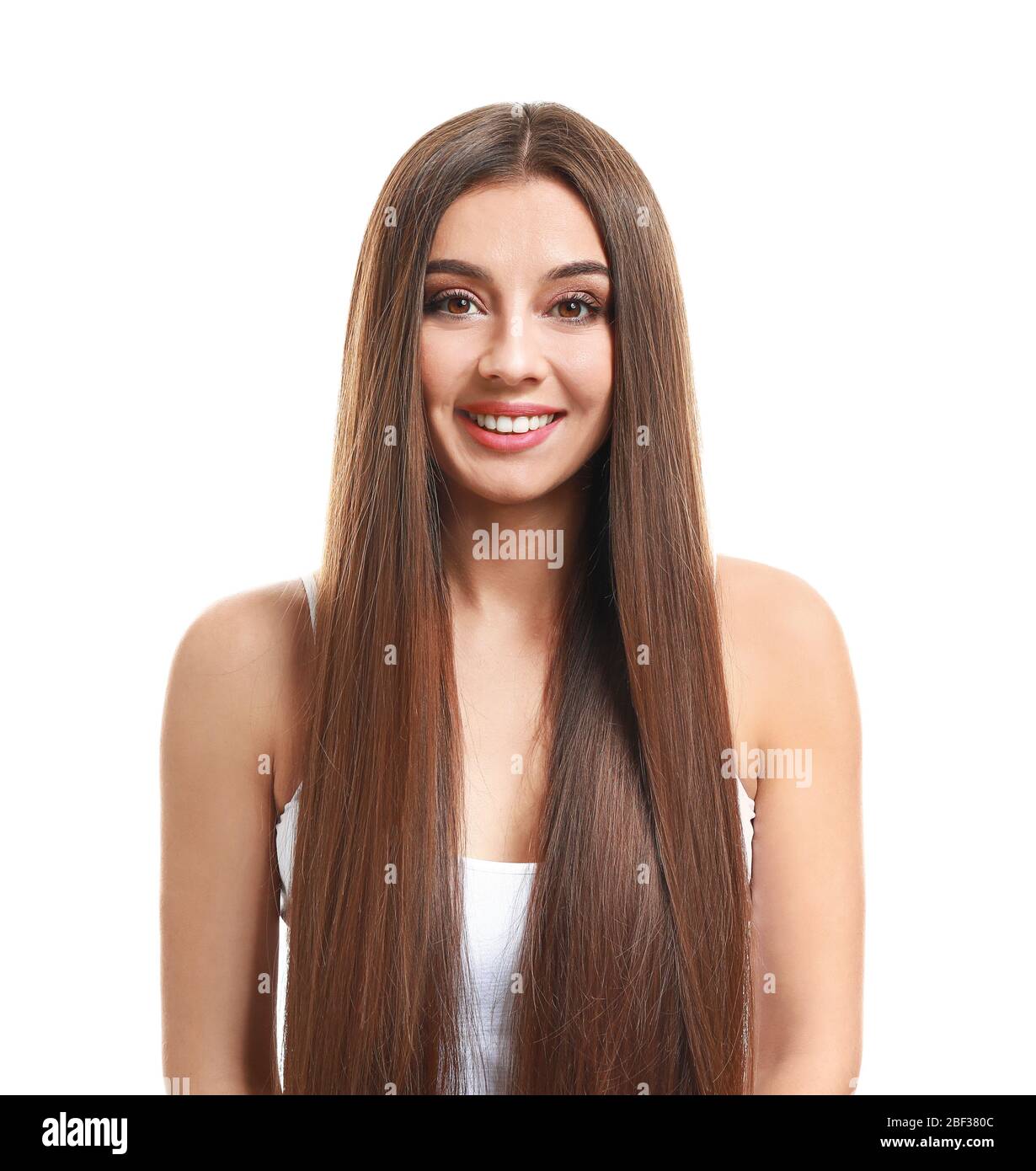 Beautiful woman with healthy long hair on white background Stock Photo ...