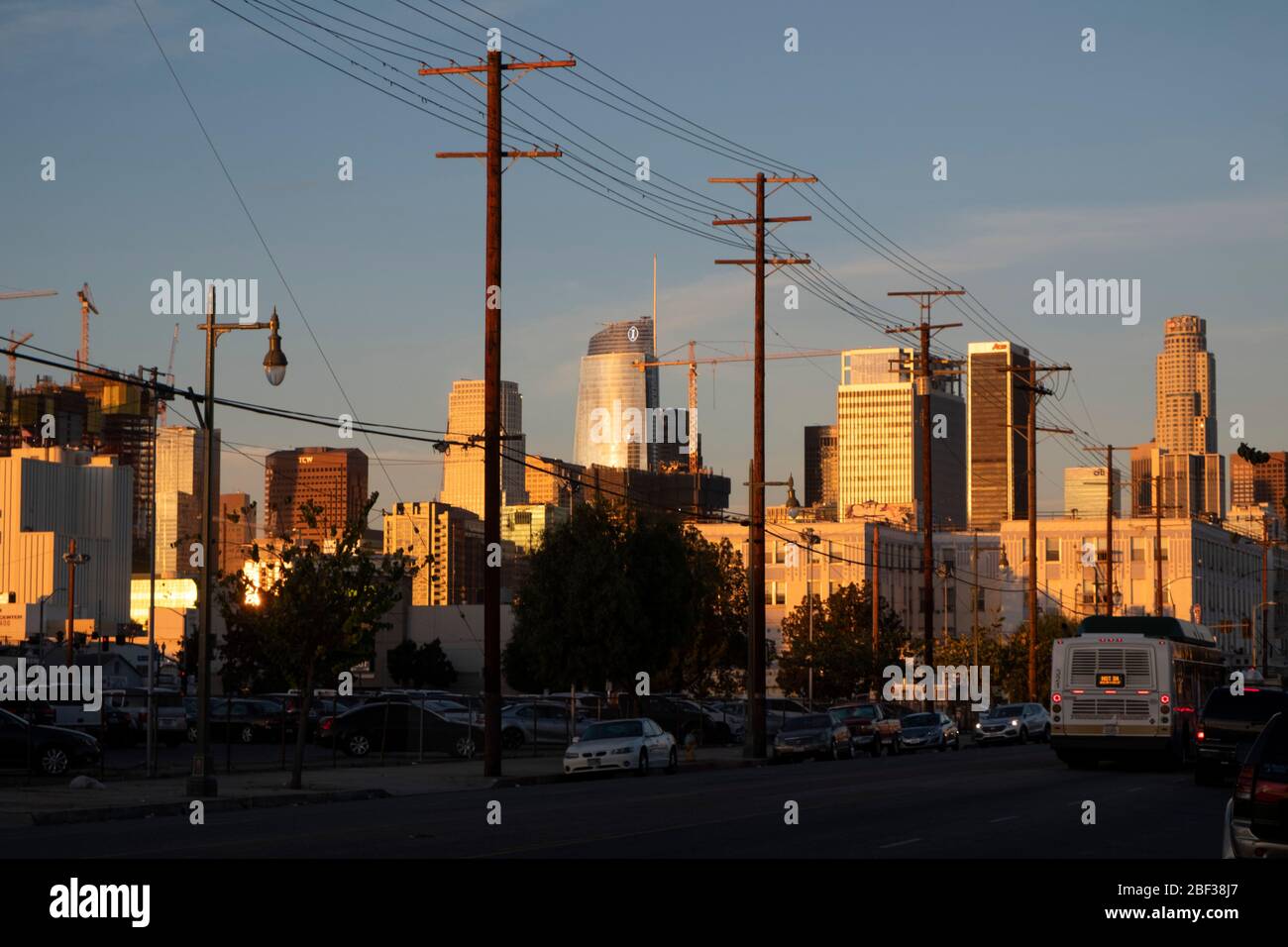 Gritty street view of downtown Los Angeles, LA skyline at sunset in the evening Stock Photo