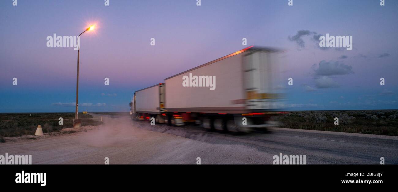 Roadtrain showing movement, Nullarbor, Plain, South Australia. Stock Photo