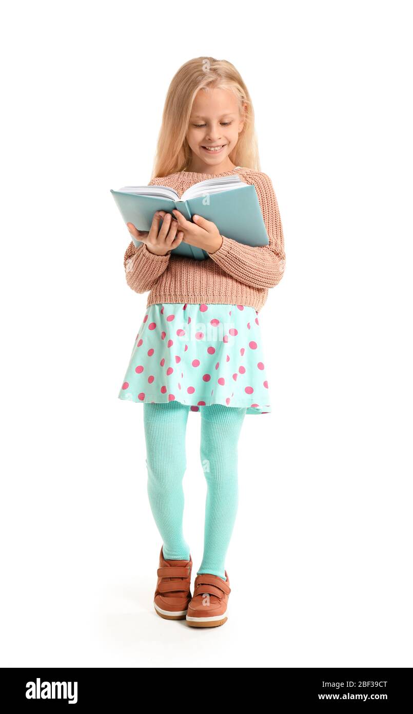 Little girl reading book on white background Stock Photo - Alamy