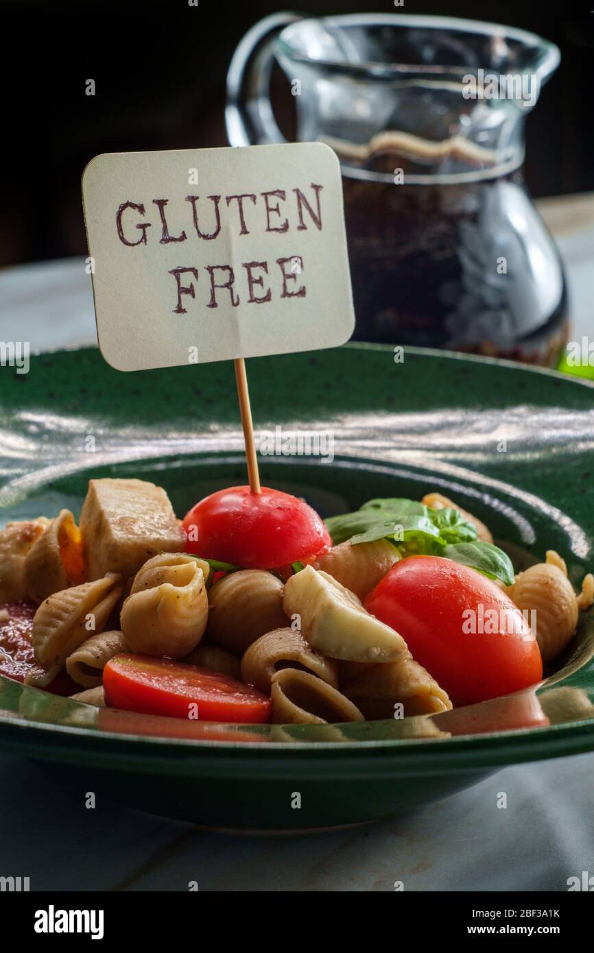 Fresh caprese pasta salad with extra virgin olive oil balsamic vinegar