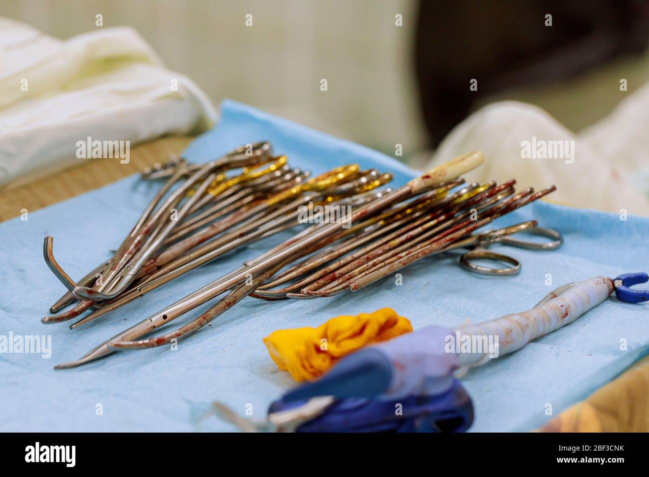 Set of different surgical instruments in the operating room in a ...