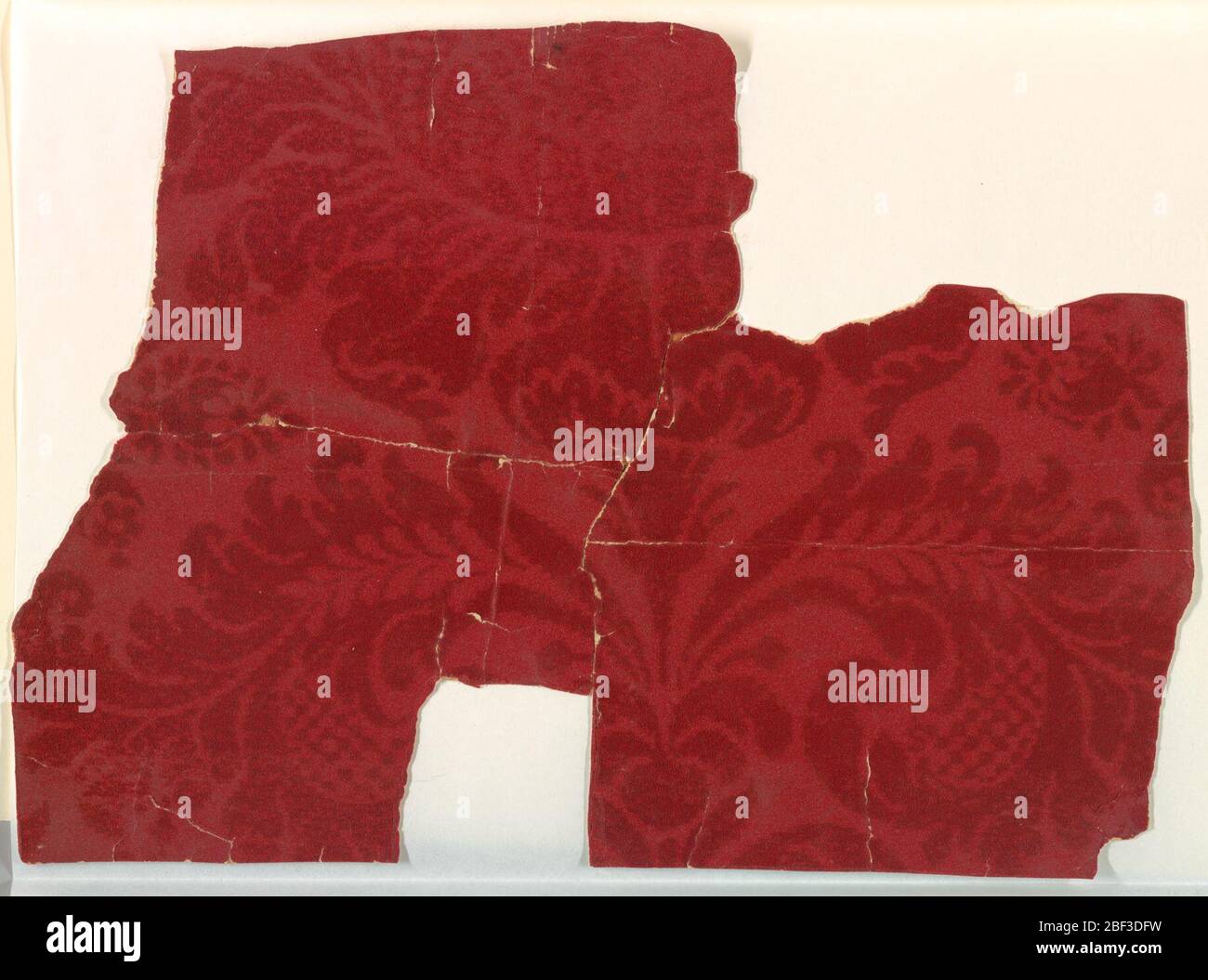Sidewall. Red flock, damask-like pattern, with step-edged outlines ...