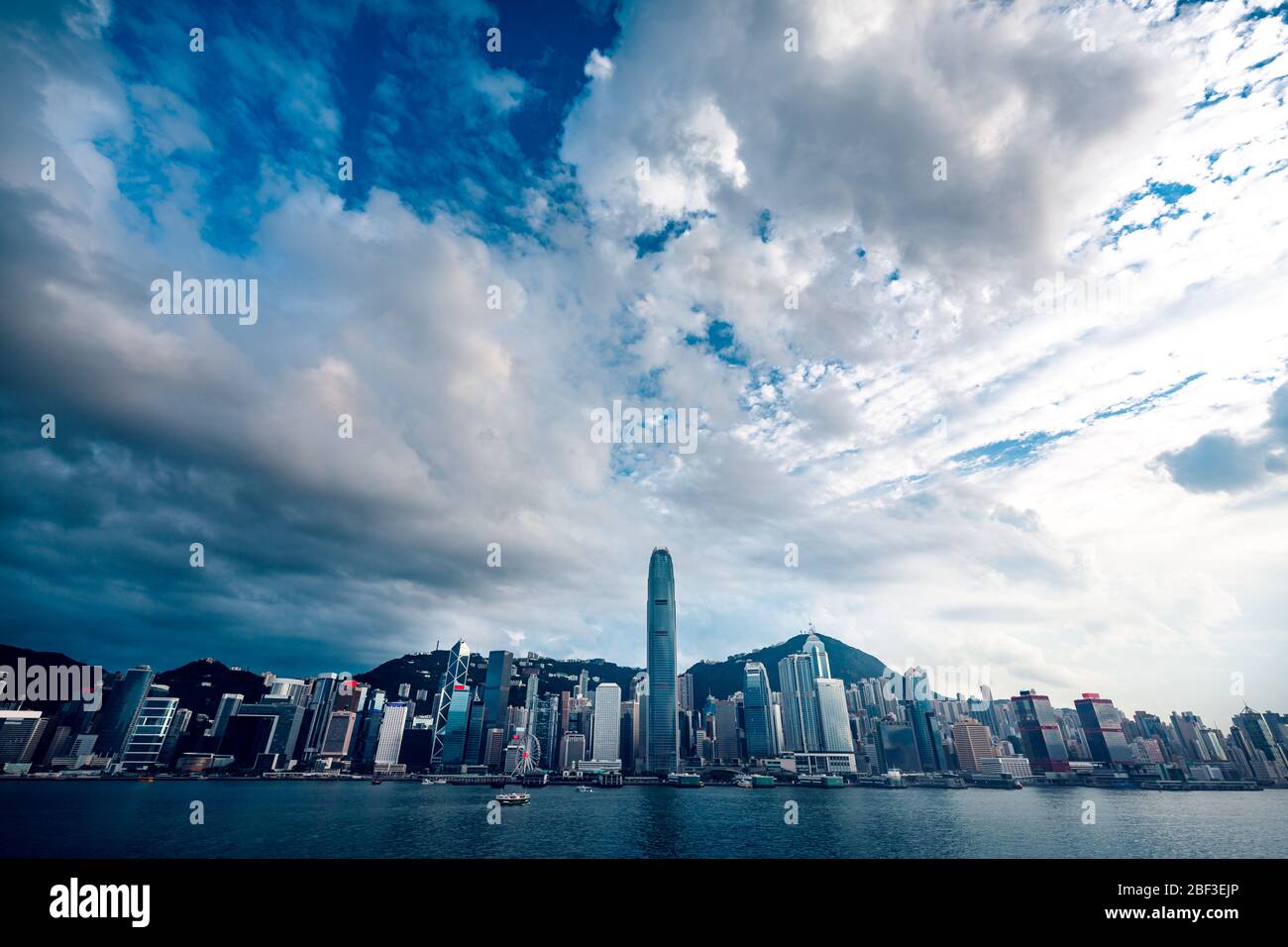 Panorama of Hong Kong City skyline from across Victoria Harbor; with Sunlight effect Stock Photo