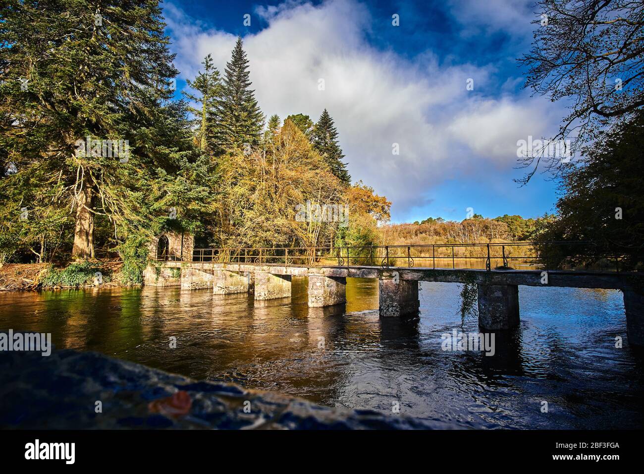 Footbridge over river at the Cong Forest Recreation area Cong, County Mayo Republic of Ireland Europe Stock Photo