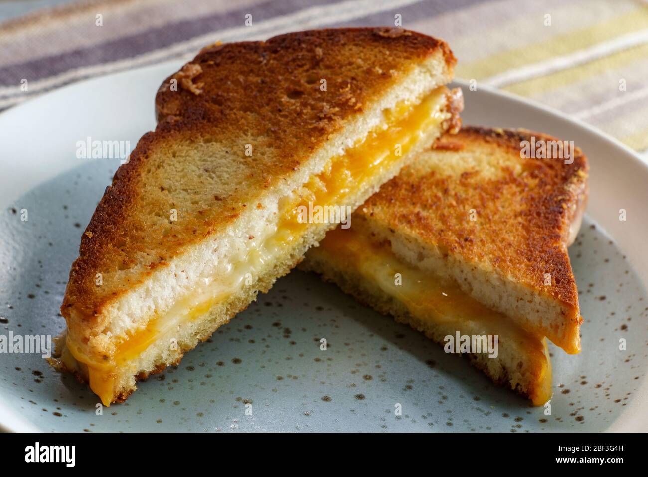 Gluten-free American grilled cheese sandwich on marble kitchen table Stock  Photo - Alamy