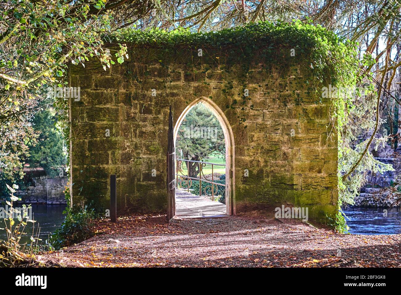 Stone archway entrance to footbridge Cong Forest Recreation area Cong, County Mayo Republic of Ireland Europe Stock Photo