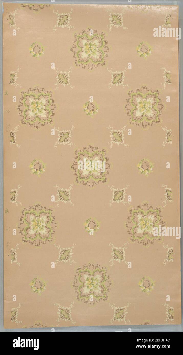 Ceiling paper. Irregular circular medallions, rather amoeba-like, with floral quatrefoil center, alternates with a diamond-shaped medallion. A round floral wreath fills the center of the grid formed by these other two medallions. Stock Photo
