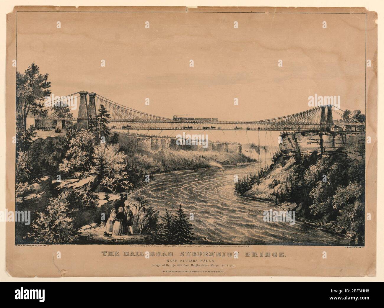 Rail Road Suspension Bridge near Niagara Falls. The bridge in the middleground between the American and Canadian banks of the Niagara River. The two levels of the bridge are indicated, a train appears on upper level with carriages on the lower level. The Falls are in the background. Stock Photo