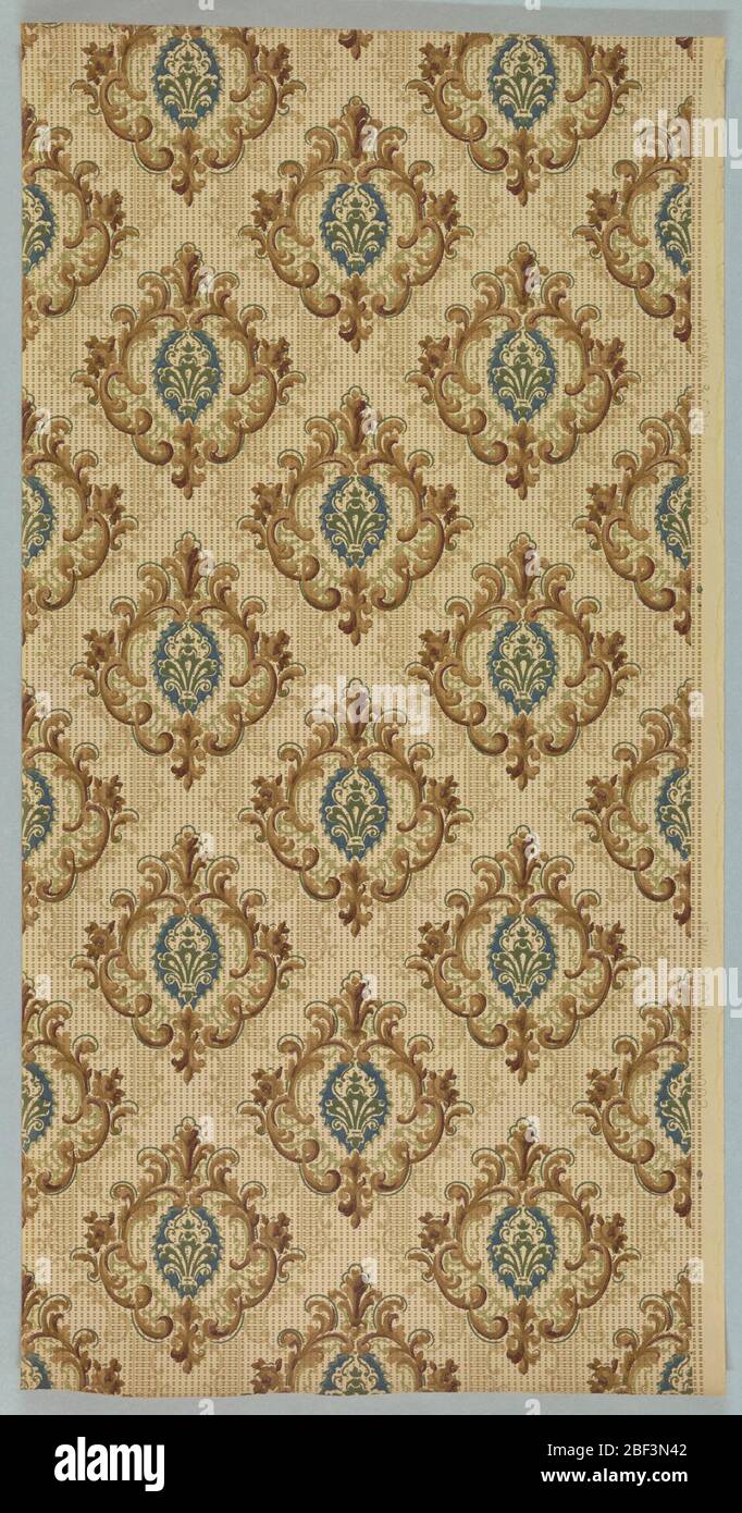 Sidewall. Diamond trellis pattern, formed by square foliate medallions. Printed in green, shades of brown and tan on off-white gridded background. Stock Photo