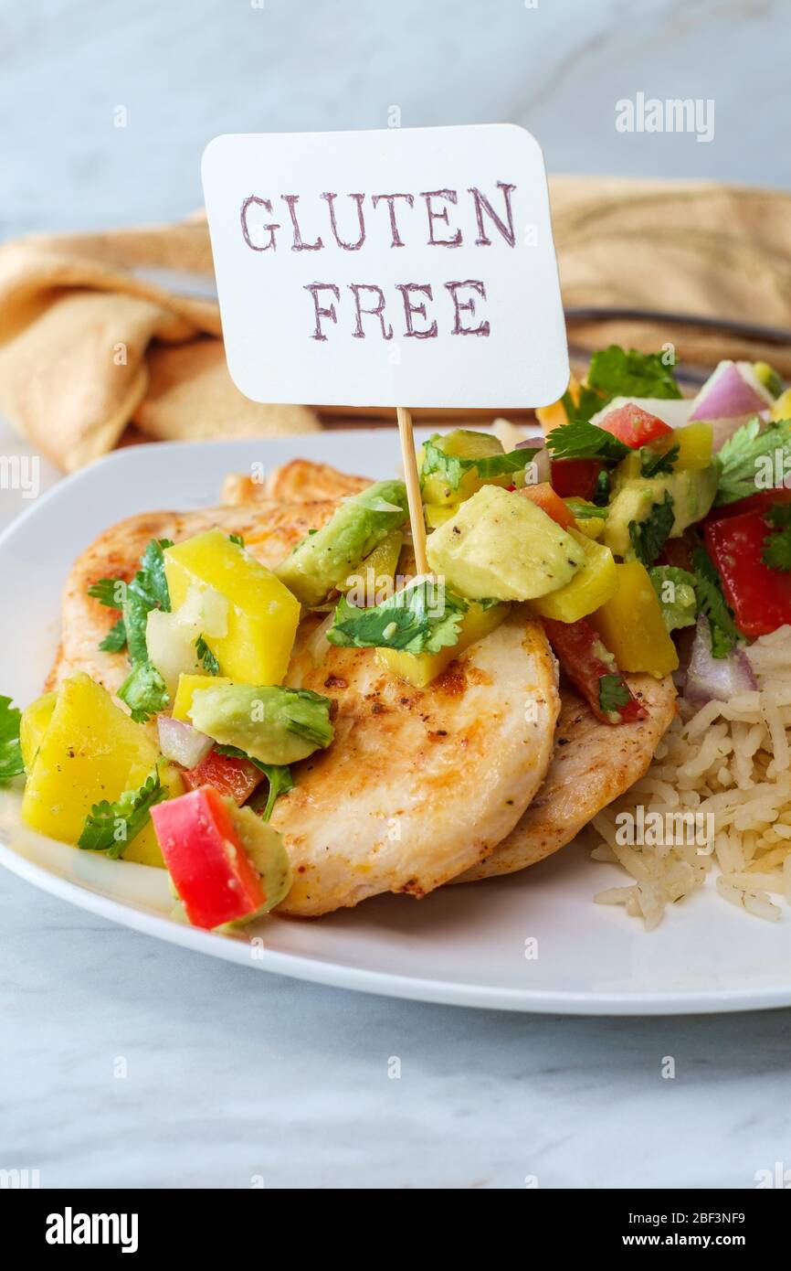 Gluten Free Mexican Grilled Chicken With Mango And Avocado Salsa Stock Photo Alamy