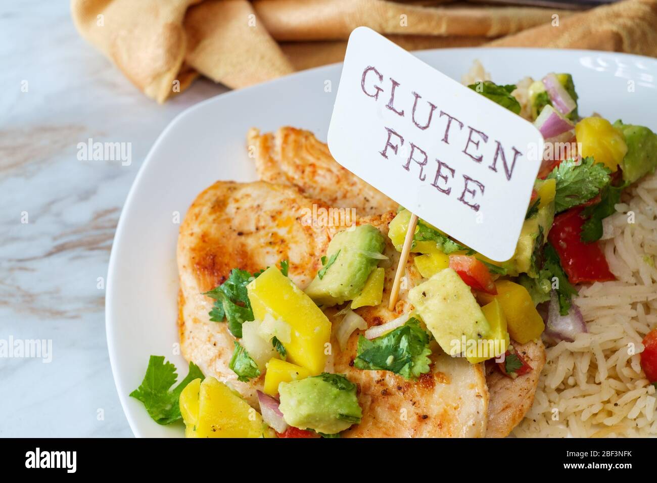 Gluten Free Mexican Grilled Chicken With Mango And Avocado Salsa Stock Photo Alamy
