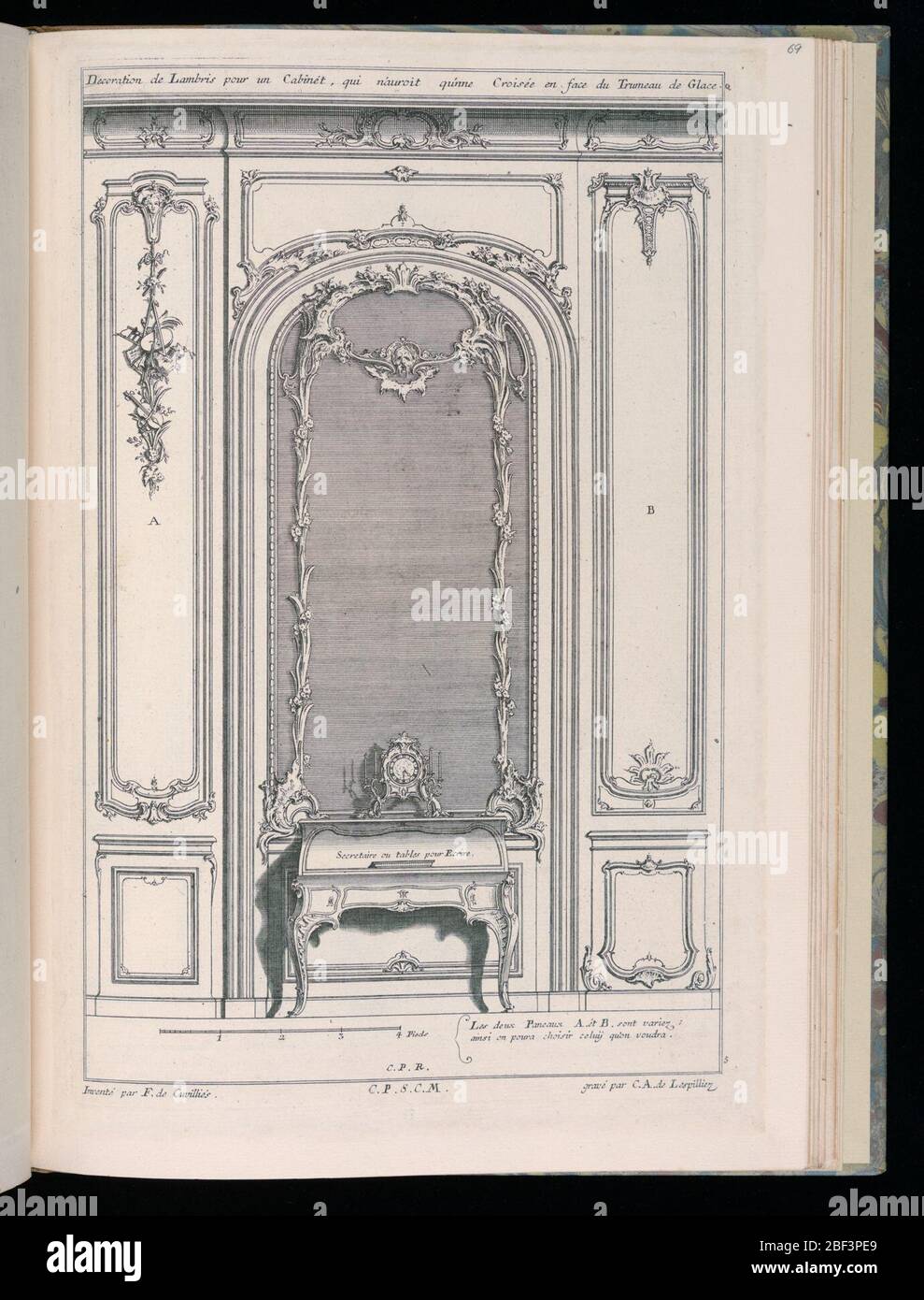 Wall with Mirror and Secretary Desk Desseins de Lambris Wainscoting Designs. Design for interior wall in Rococo style. At the center, a large arched mirror framed and decorated with ornament in the form of floral festoons, a mask hanging from the garland at upper center. Stock Photo