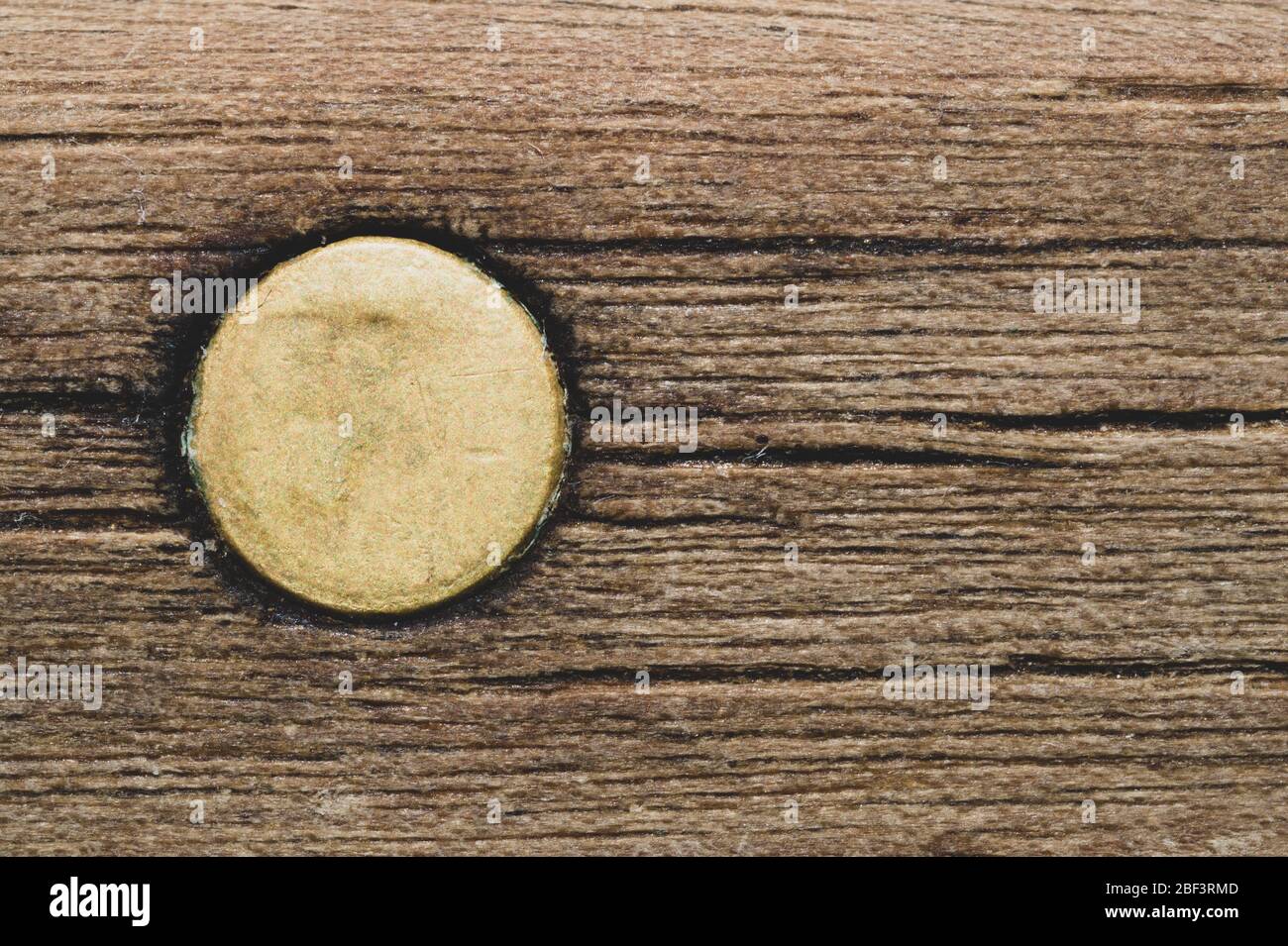 Old wooden background with a dowel. wood texture with a metal pin Stock Photo