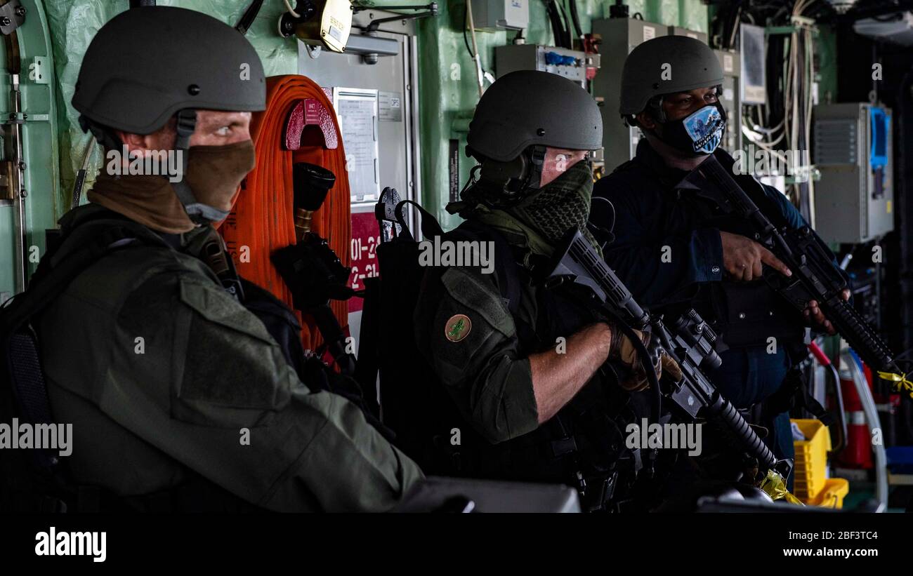 KEY WEST, Fla. (April 15, 2020) Sailors conduct a visit, board, search and seizure drill in the pilot house aboard the Freedom-class littoral combat ship USS Detroit (LCS 7) while in port at Key West, Fla. Detroit is deployed to the U.S. Southern Command area of responsibility to support Joint Interagency Task Force South's mission, which includes counter illicit drug trafficking in the Caribbean and Eastern Pacific. (U.S. Navy photo by Mass Communication Specialist 2nd Class Anderson W. Branch/Released) Stock Photo