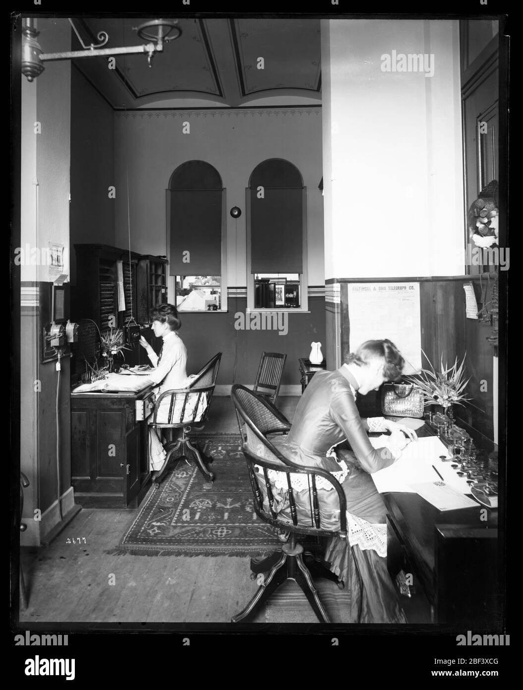 Women in Telegraph Office. Also known as 3677.See also Record Unit 95, Box 32, Folder 21.Female employees in the Telephone and Telegraph Office in the North Tower of the United States National Museum, now known as the Arts and Industries Building.Smithsonian Institution Archives, Acc. Stock Photo
